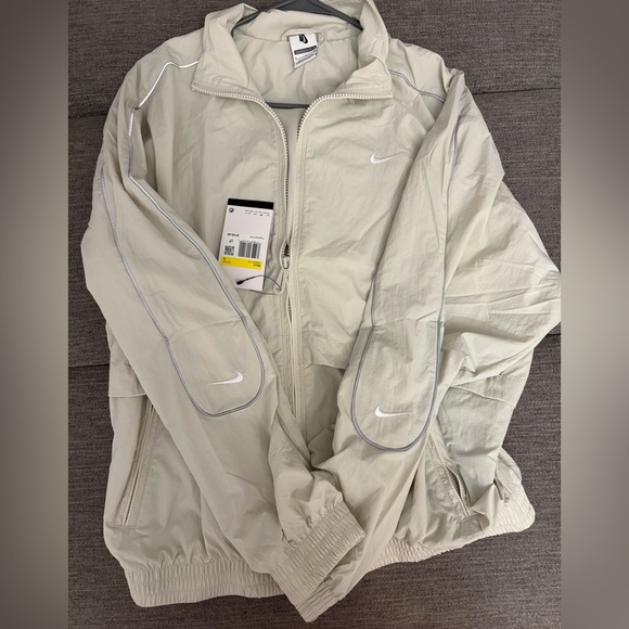 Nike Solo Swoosh Track Jacket in Light Bone/White - Picture 7 of 9
